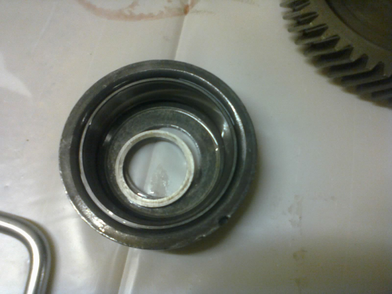 Before taking out the transfer shaft, we must first remove this upper race retainer